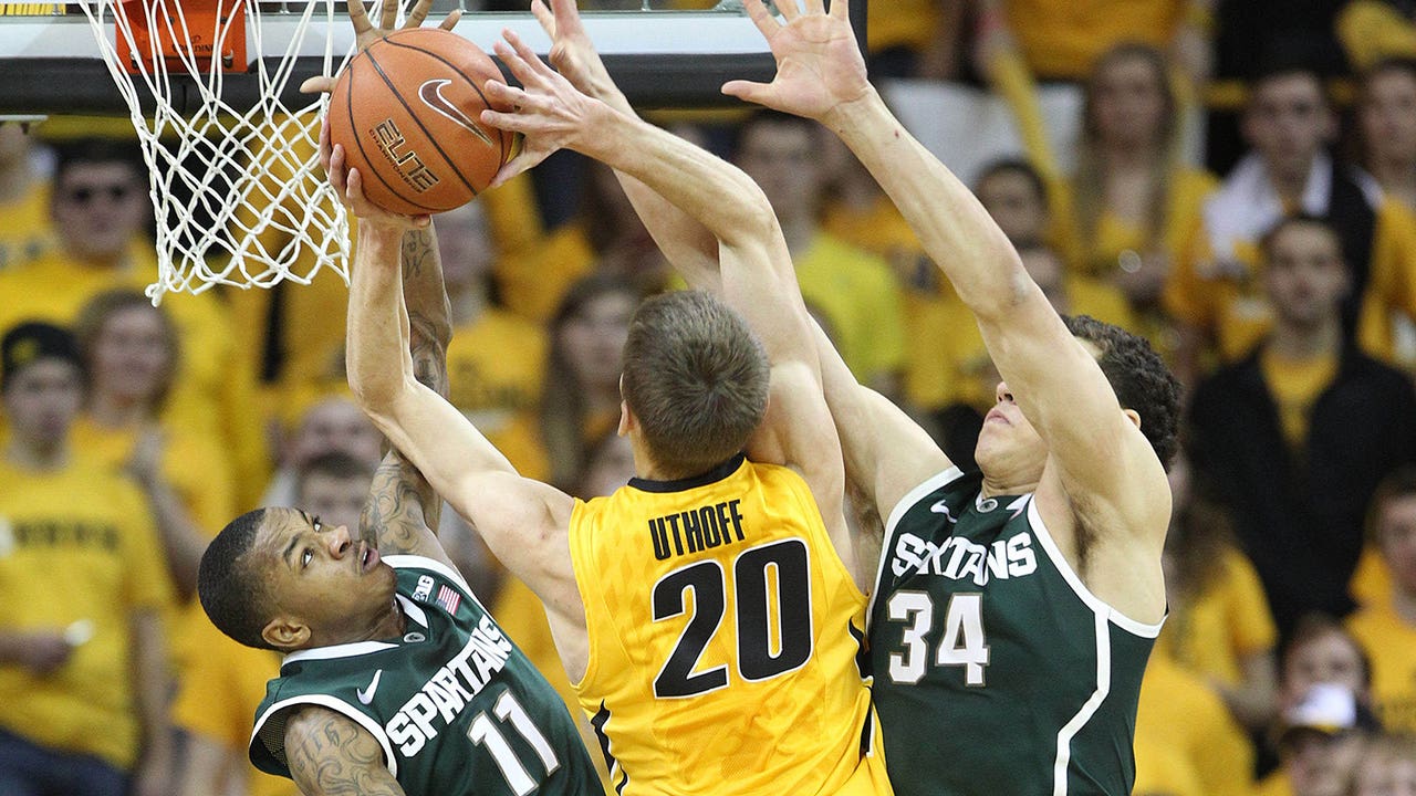 Undermanned Spartans beat Hawkeyes in OT
